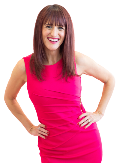 Gretchen Hydo in pink dress, standing with hands on hips.